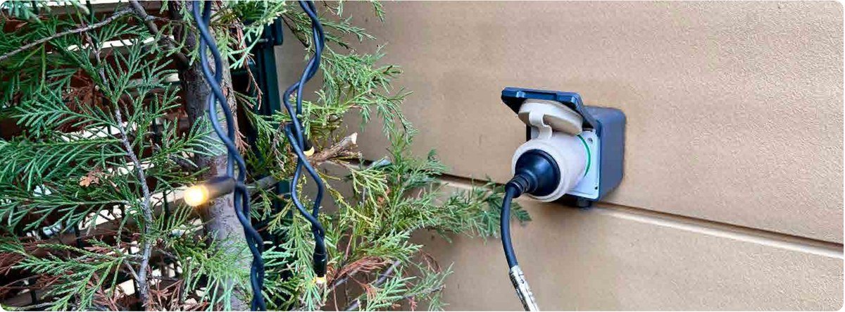 Outdoor smart plug in a garden
